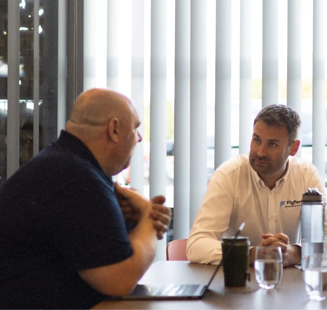Phil Farey from Flyford Connect in a meeting with a client